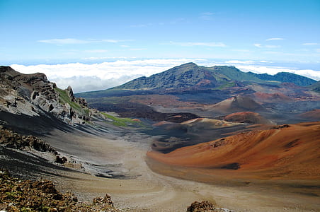 mountains and valleys under clear blue sky thumbnail