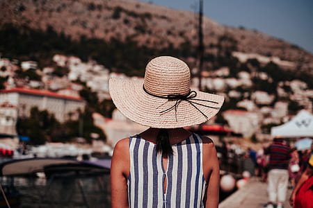 woman wearing sun hat thumbnail