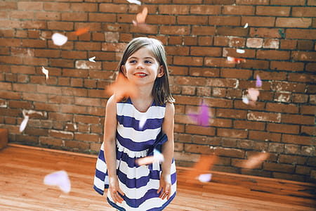 Blue & White Striped Dress On Girl Photo thumbnail