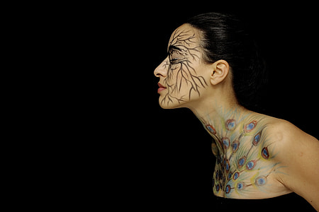 photo of woman with face and body tattoo thumbnail