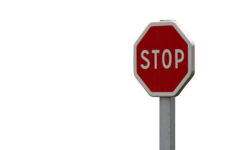 selective focus photography of stop signage thumbnail