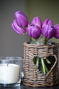 shallow focus photography of purple petaled flowers in glass jar thumbnail
