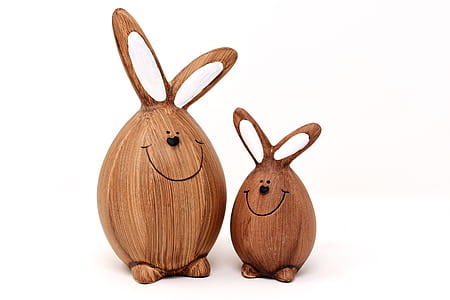 two brown wooden animal decors thumbnail
