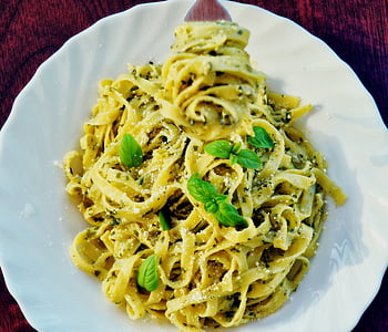 fettuccine pesto dish served on white plate thumbnail