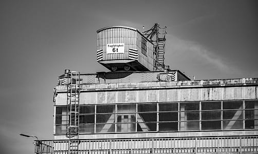grayscale photography of building structure thumbnail