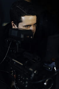 man in black suit thumbnail
