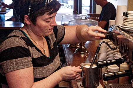 woman using espresso machine thumbnail