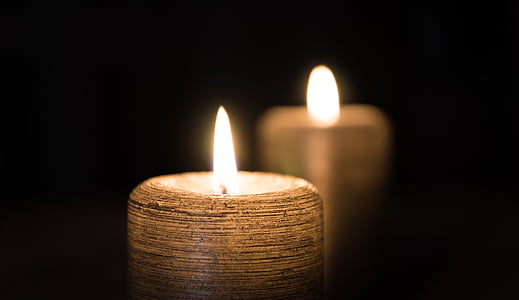 two white candles thumbnail