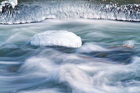 photography of floating ice at daytime thumbnail