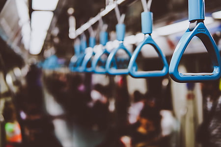 blue plastic transportation handles selective focus photography thumbnail