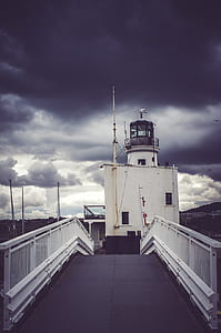 View of Cloudy Skies on Lighthouse thumbnail