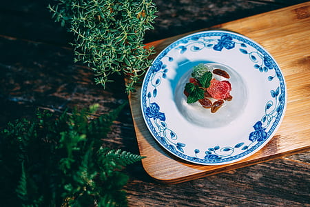 strawberry on white and blue plate thumbnail