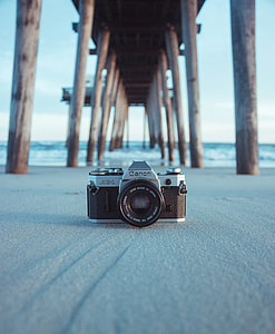 black and gray Canon digital camera thumbnail