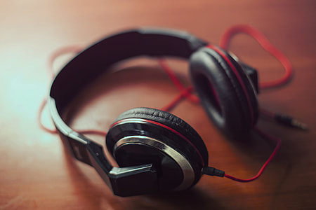shallow focus photography of black and red headphones thumbnail