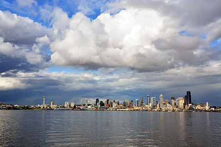 city buildings near body of water thumbnail