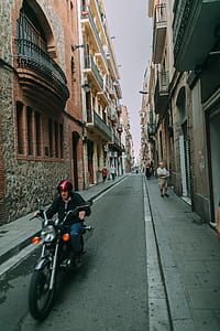 Man Riding Black Standard Motorcycle thumbnail