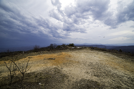 Hilltop landscape under the sky and clouds at Sassafras Mountain, South Carolina thumbnail