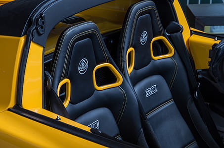 black and yellow vehicle seats thumbnail