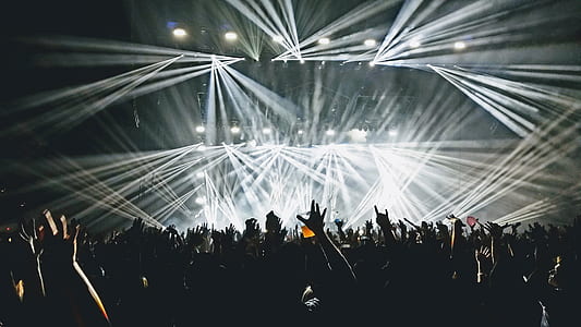 photo of people infront of stage with lights thumbnail