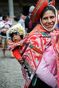 woman carrying child on her back thumbnail