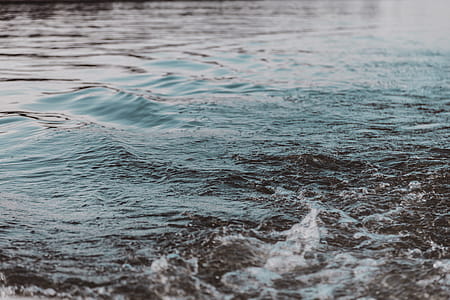 Close-up Photography of Body of Water thumbnail