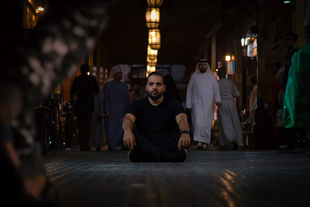 man sitting on floor thumbnail