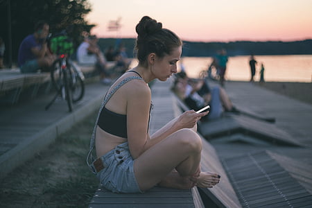 woman sitting on pathway thumbnail