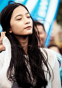 woman wearing white top thumbnail