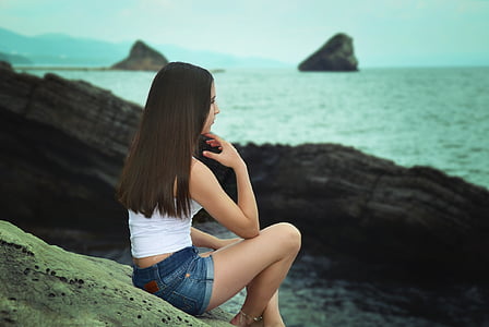 girl wearing white crop top and shorts thumbnail