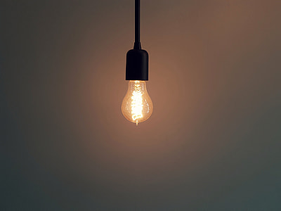 selective focus photography of turned on light bulb thumbnail