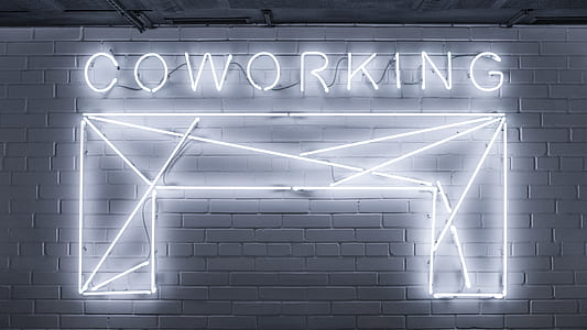 Coworking neon sign on wall thumbnail