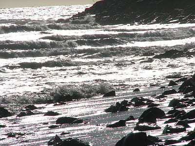 body of water splashed on rocks thumbnail