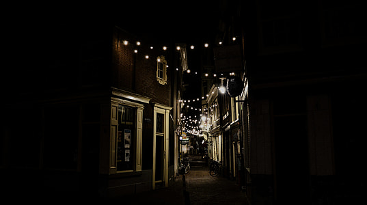 low-angle photography of lighted pathway thumbnail