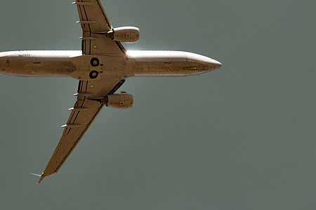 aerial photography of white plane flying thumbnail