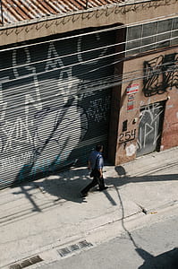 man walking on street thumbnail