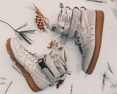 pair of white-and-brown Nike Air Force 1 shoes thumbnail
