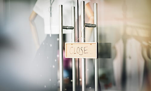 Close door signage hanging on metal handle thumbnail