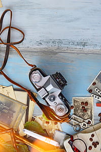 Gray and Black Bridge Camera on Gray Wooden Surface thumbnail