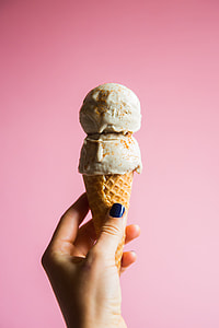 person holding ice cream with cone thumbnail