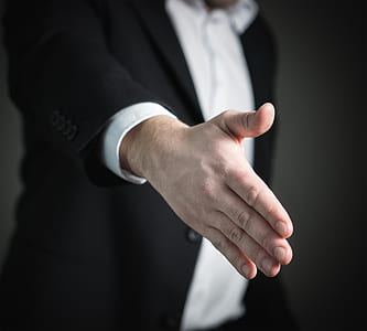 selective focus photo of man's hand thumbnail