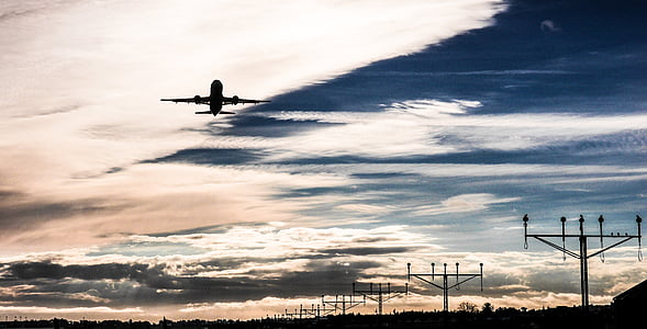 low angle photography of airplane on sky thumbnail