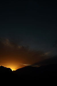 silhouette photography of mountain at daytime thumbnail