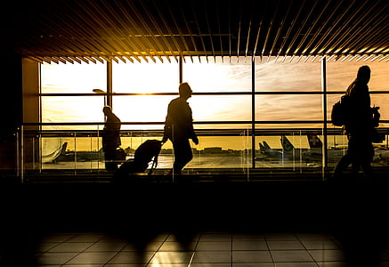 man on airport during sunset thumbnail