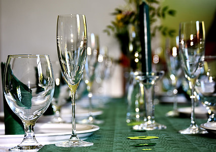 close-up photography of assorted clear glasses on green table thumbnail