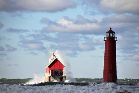 lighthouse beside house thumbnail