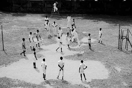 aerial photography of men on field playing volleyball thumbnail