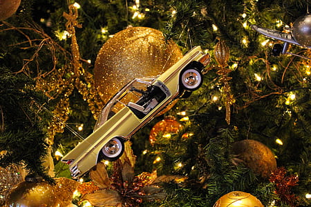 closeup photogrpahy of yellow car scale model thumbnail