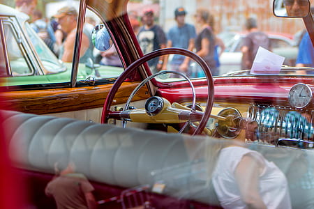 empty vehicle near people surrounded by crowd thumbnail