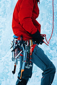 man holding rope and tools thumbnail