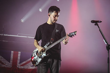 Man Wearing Black T-shirt And Playing Electric Guitar thumbnail